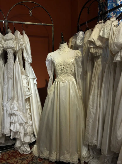 Vintage Champagne High Neck Lace Long Sleeve Buttoned Satin Floor-Length Wedding Dress P3057