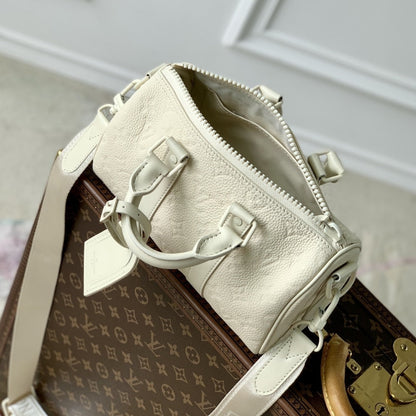 LOUIS VUITTON KEEPALL BANDOULIÈRE 25 BAG CREAM 25CM M24434