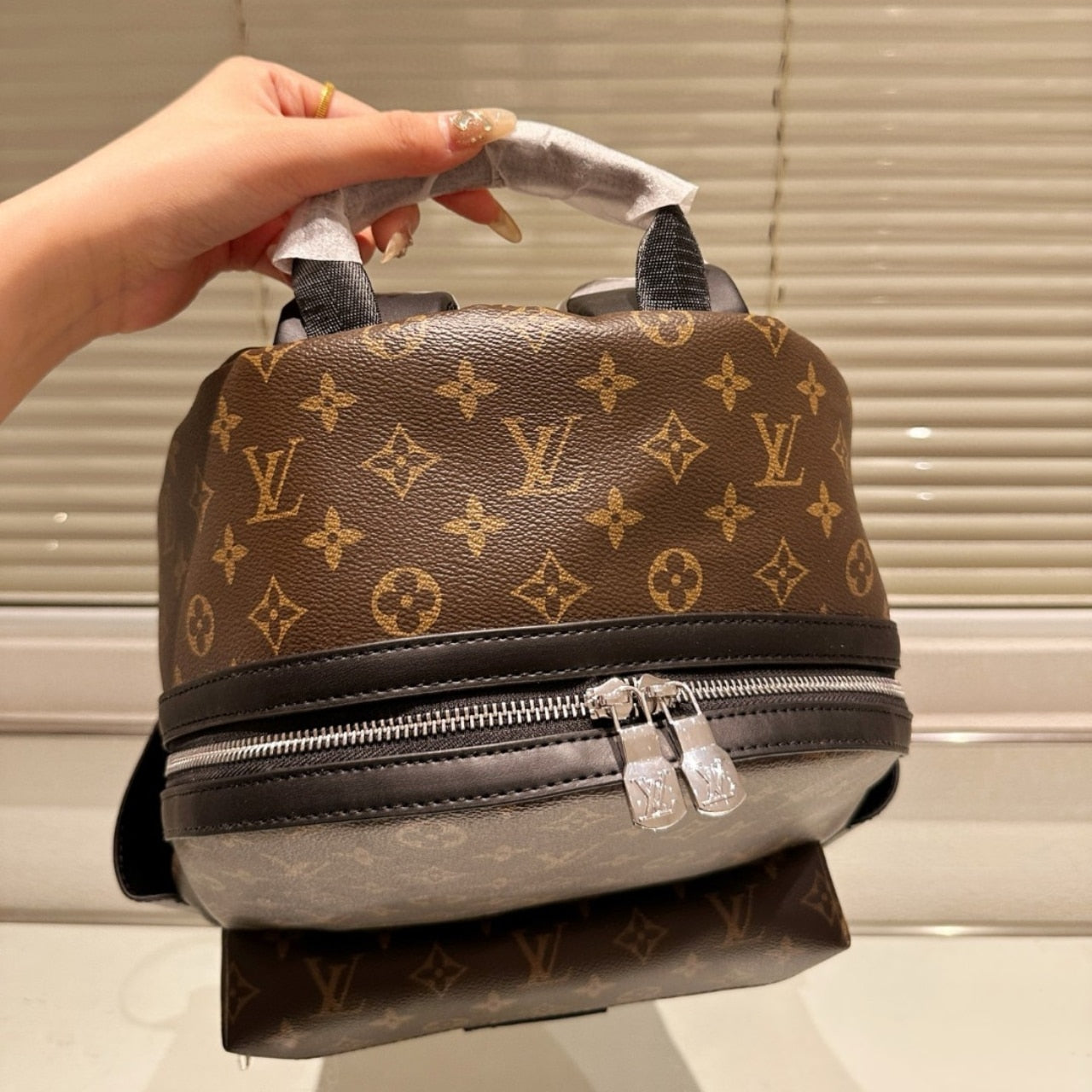LOUIS VUITTON DISCOVERY PM BACKPACK MACASSAR MONOGRAM BROWN 40CM M46684