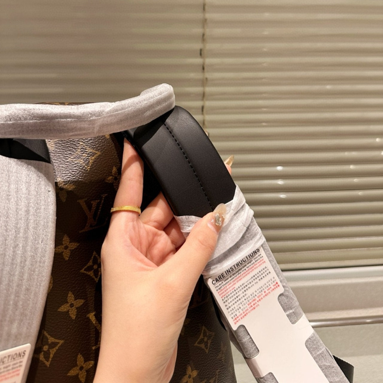 LOUIS VUITTON DISCOVERY PM BACKPACK MACASSAR MONOGRAM BROWN 40CM M46684