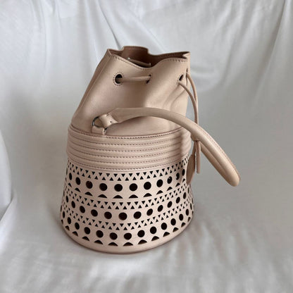 Alaia Laser-cut Corset Bucket Top-handle Bag In Galet