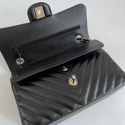 Chanel black chevron quilted leather double flap bag