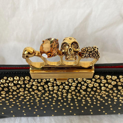 Alexander Mcqueen Skull Four-Ring Clutch Bag