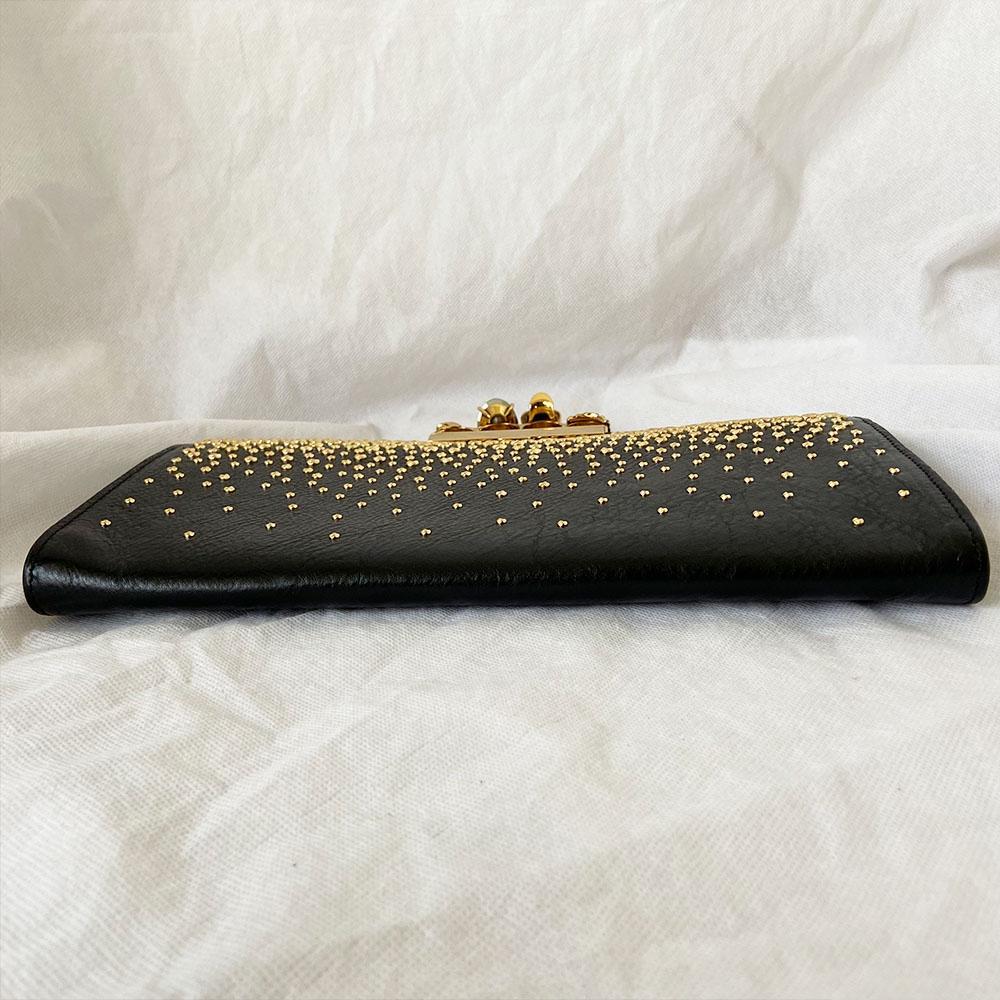 Alexander Mcqueen Skull Four-Ring Clutch Bag