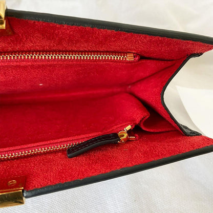 Alexander Mcqueen Skull Four-Ring Clutch Bag