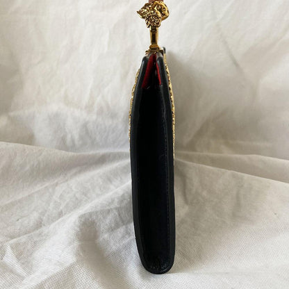 Alexander Mcqueen Skull Four-Ring Clutch Bag