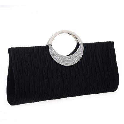 Women's pleated hand-carved evening bag with diamonds