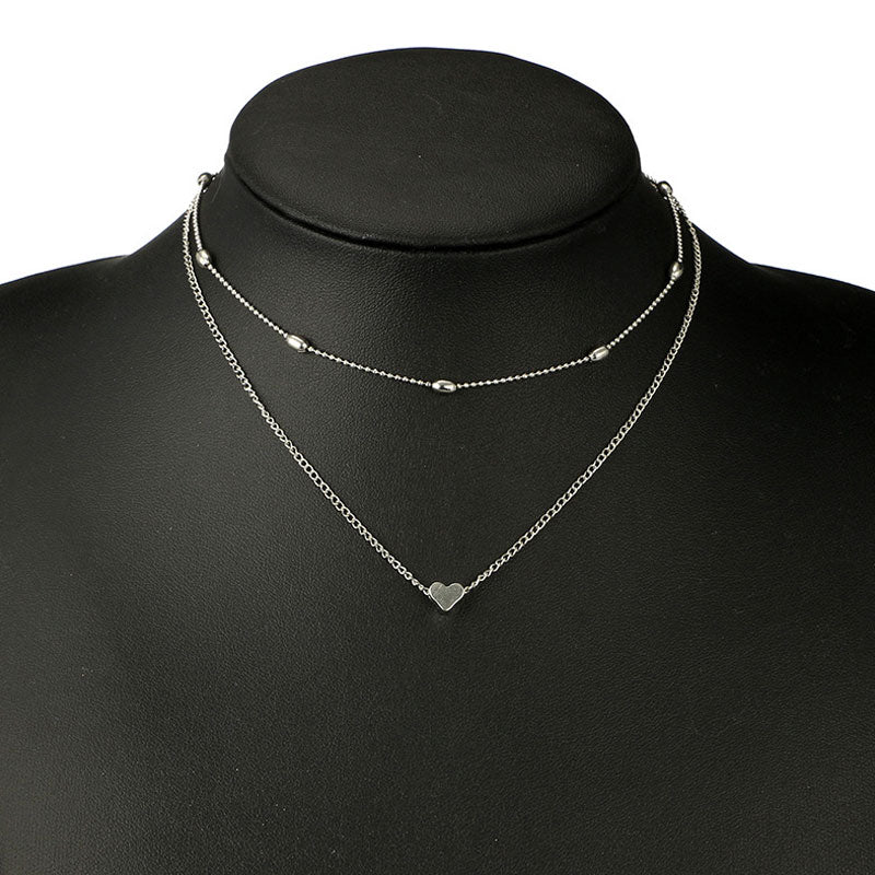 Lovingly simple two-tier brass collar necklace