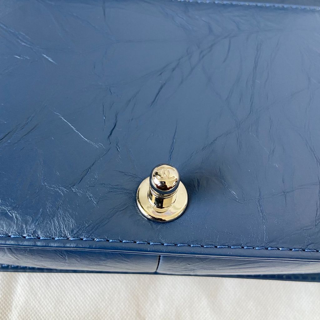 Chanel Aged Calfskin Chevron Quilted Medium Jacket Boy Flap