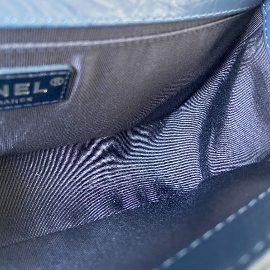 Chanel Aged Calfskin Chevron Quilted Medium Jacket Boy Flap