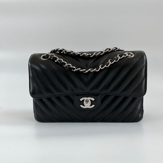 Chanel black chevron quilted leather double flap bag