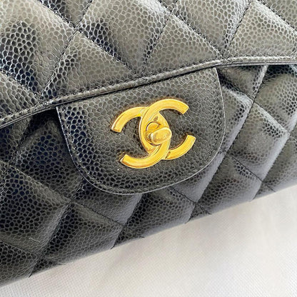 Chanel black jumbo caviar classic flap bag