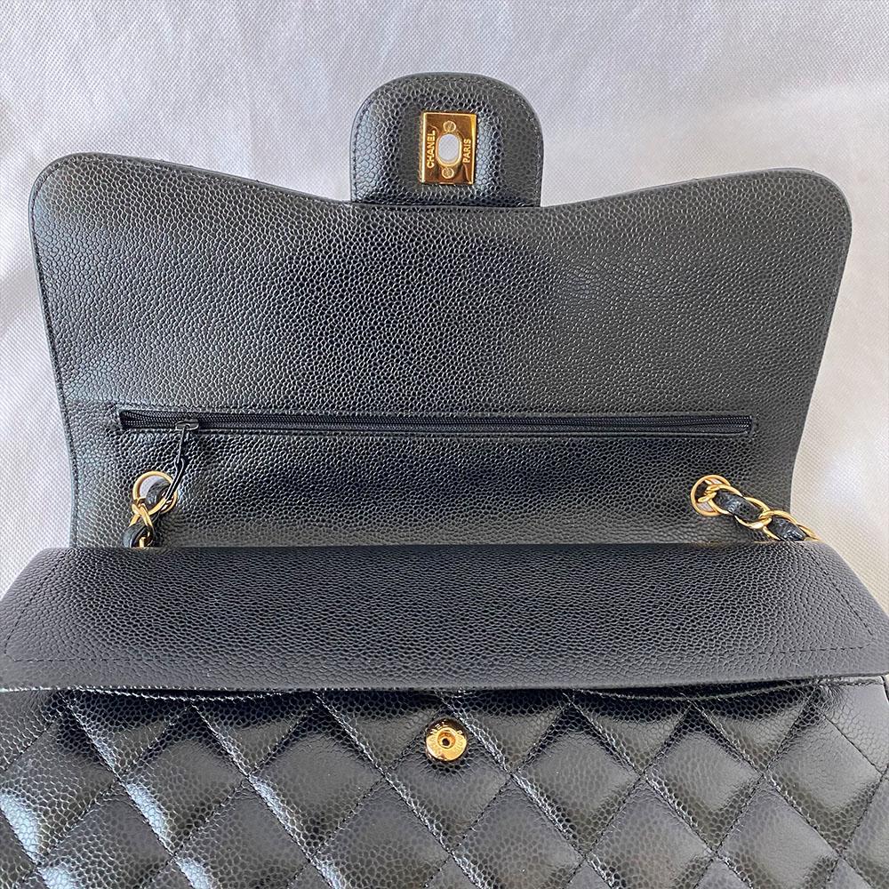 Chanel black jumbo caviar classic flap bag