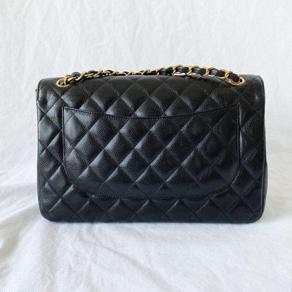 Chanel black jumbo caviar classic flap bag