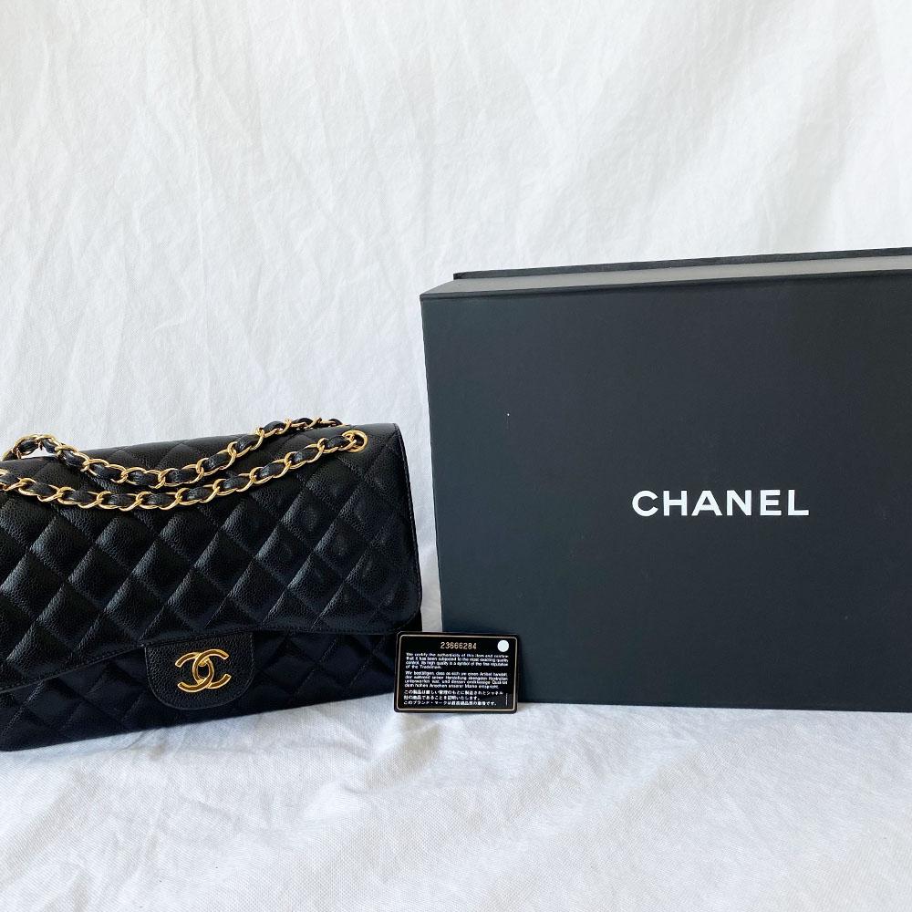 Chanel black jumbo caviar classic flap bag