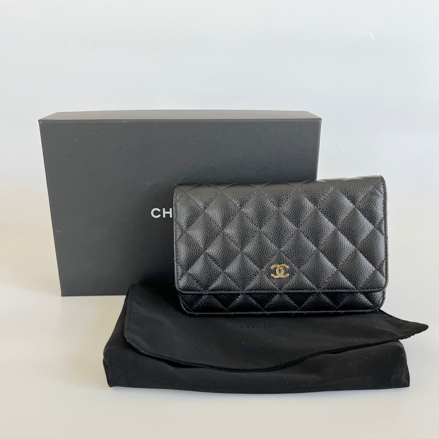 Chanel black quilted caviar leather wallet on chain
