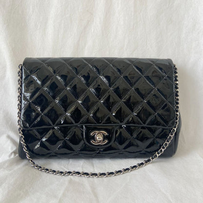 Chanel black quilted patent leather flap bag