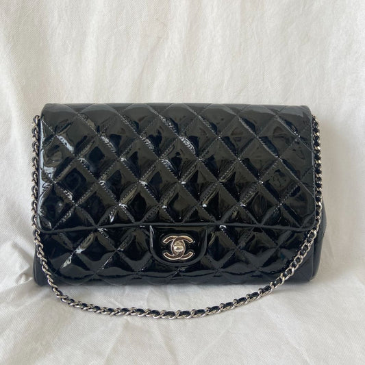 Chanel black quilted patent leather flap bag