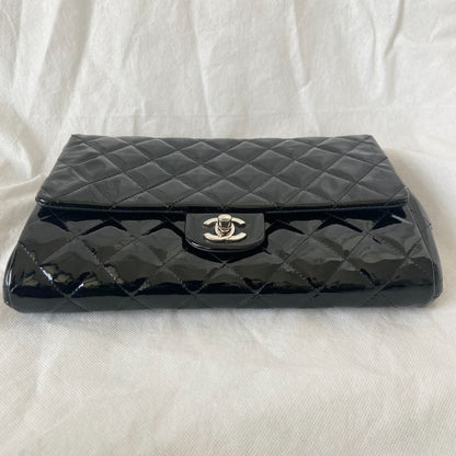 Chanel black quilted patent leather flap bag
