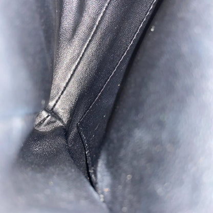 Chanel black quilted patent leather flap bag