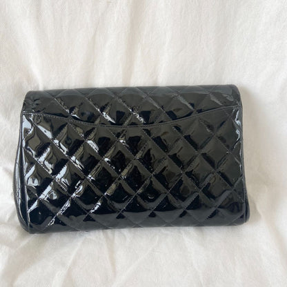 Chanel black quilted patent leather flap bag