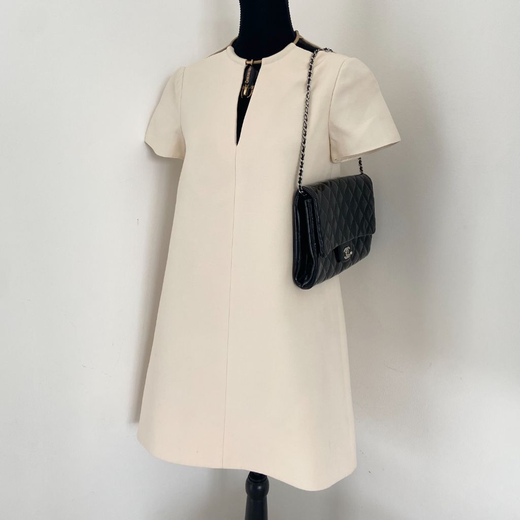 Chanel black quilted patent leather flap bag