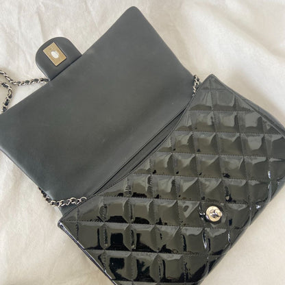 Chanel black quilted patent leather flap bag