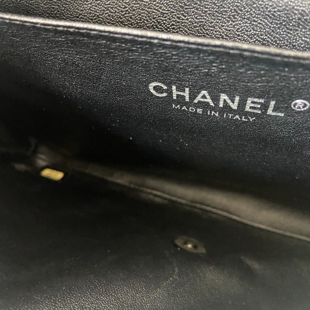 Chanel black quilted patent leather flap bag