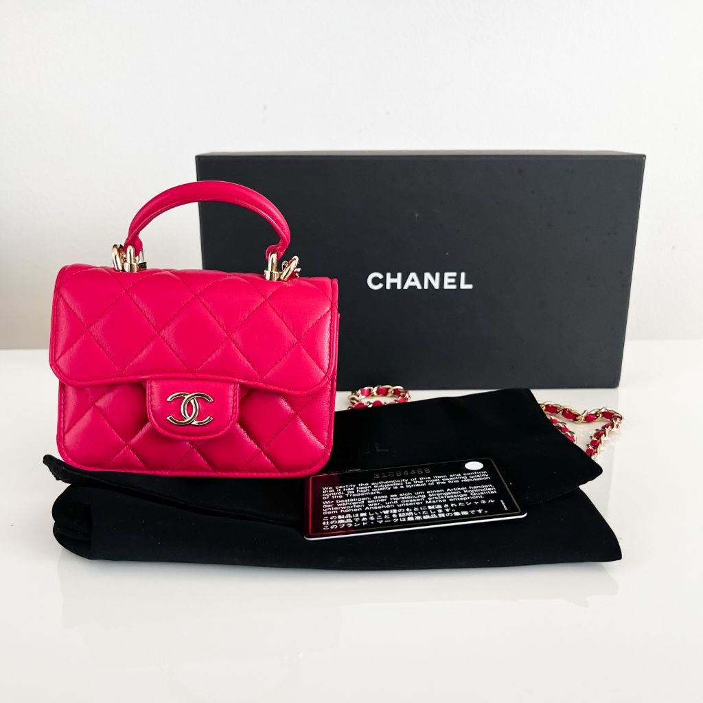 Chanel pink quilted lambskin top handle micro top handle flap bag