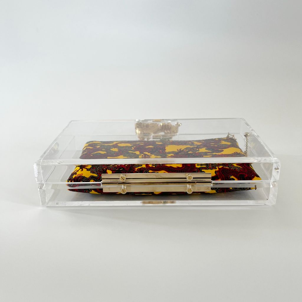 Charlotte Olympia clear plexi clutch with dragon lock