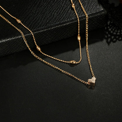 Lovingly simple two-tier brass collar necklace