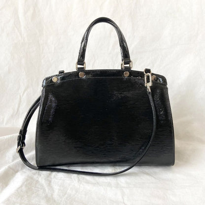 Louis Vuitton Brea handbag in black patent epi leather