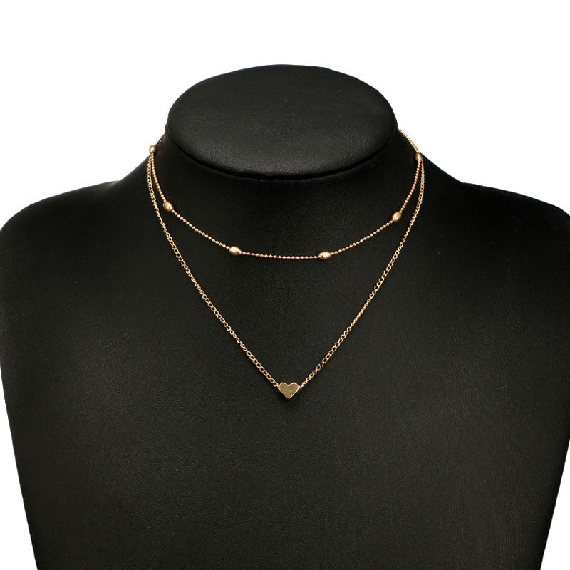 Lovingly simple two-tier brass collar necklace