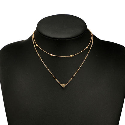 Lovingly simple two-tier brass collar necklace