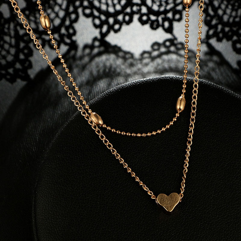 Lovingly simple two-tier brass collar necklace