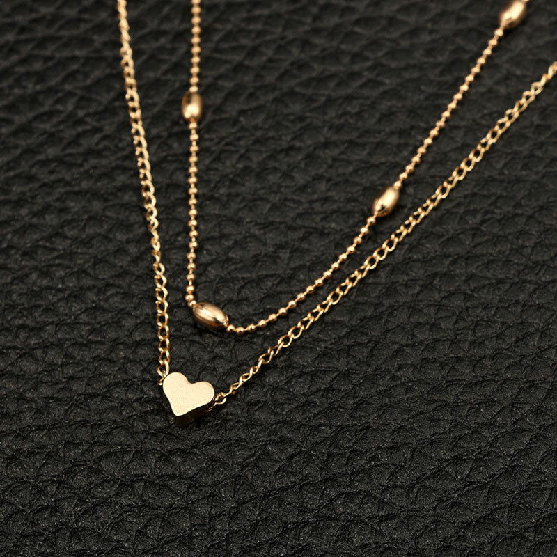 Lovingly simple two-tier brass collar necklace