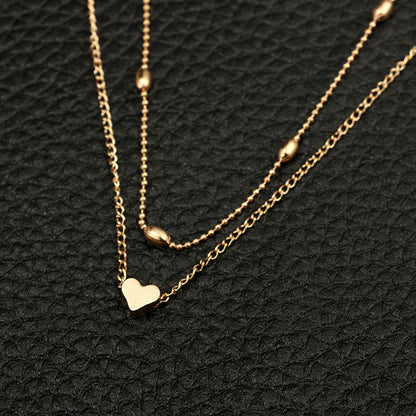 Lovingly simple two-tier brass collar necklace