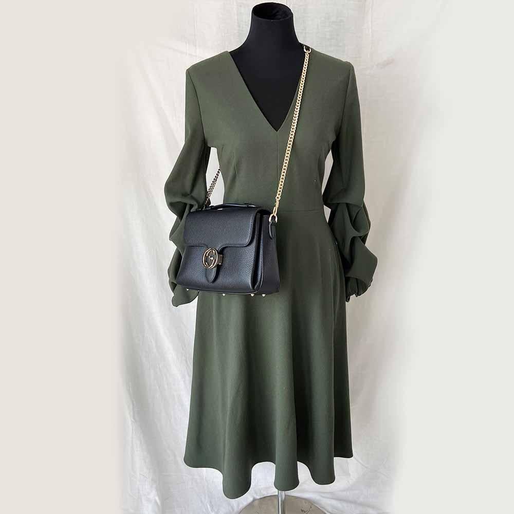 Gucci interlocking G black leather flap bag with goldtone hardware