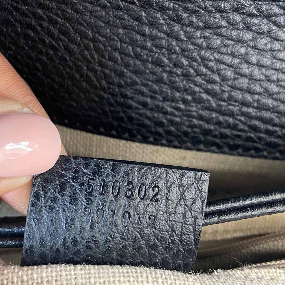 Gucci interlocking G black leather flap bag with goldtone hardware