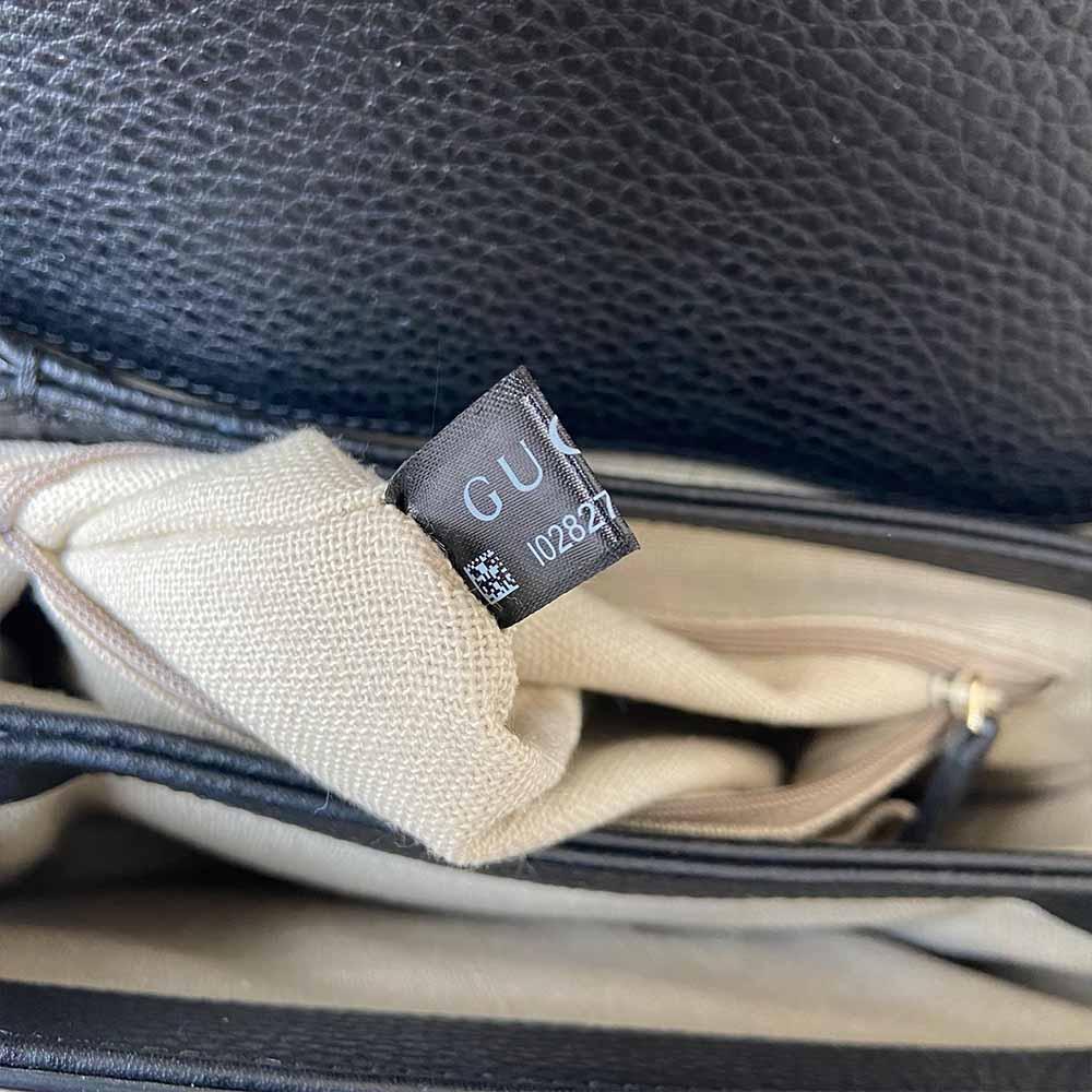 Gucci interlocking G black leather flap bag with goldtone hardware