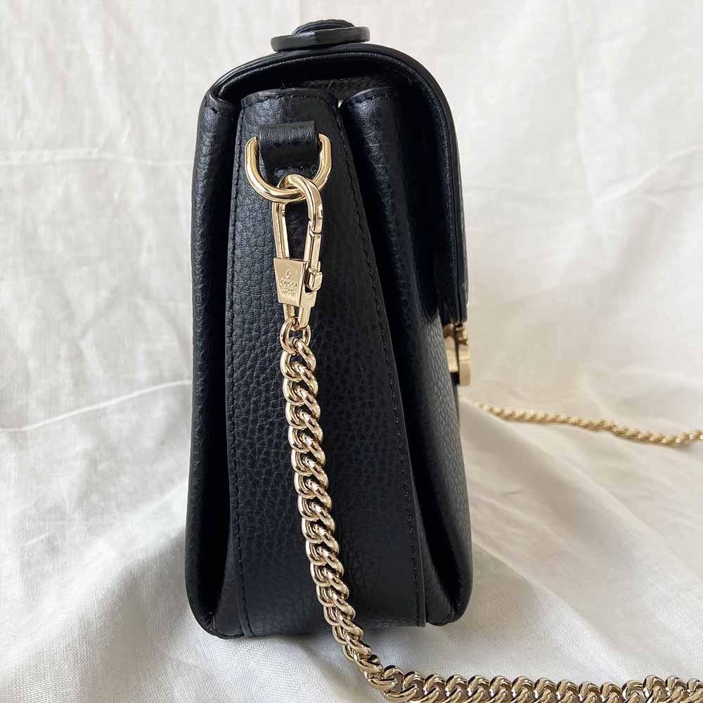 Gucci interlocking G black leather flap bag with goldtone hardware