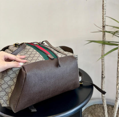 GUCCI OPHIDIA GG MEDIUM BACKPACK