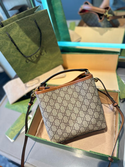 GUCCI GG Emblem mini bucket bag