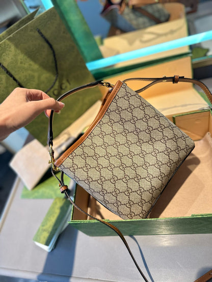 GUCCI GG Emblem mini bucket bag