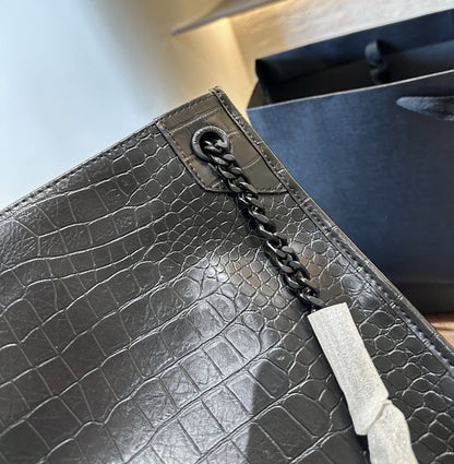 SAINT LAURENT NIKI shopping in crocodile-embossed leather