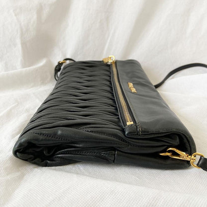 Miu Miu black leather matelasse fold over clutch bag