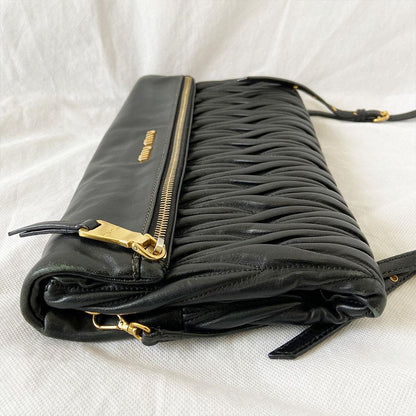 Miu Miu black leather matelasse fold over clutch bag