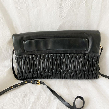 Miu Miu black leather matelasse fold over clutch bag