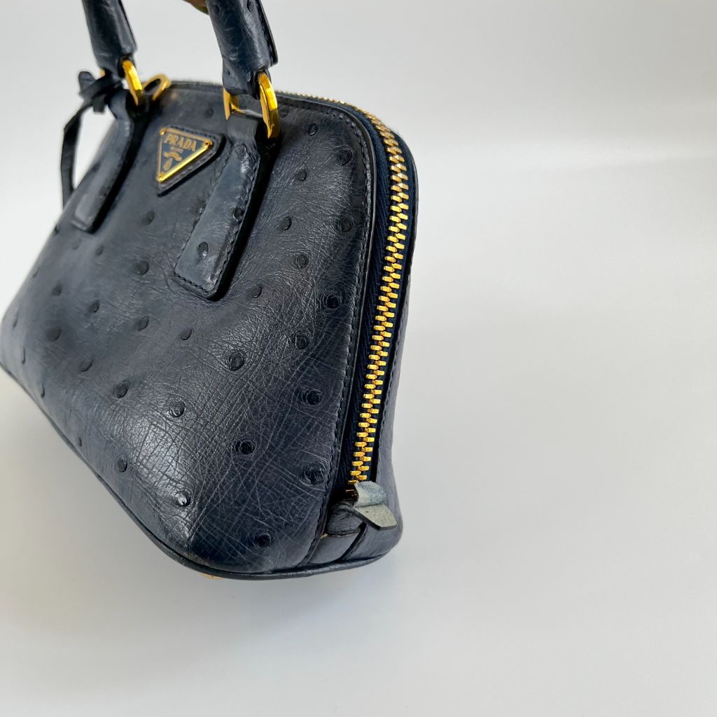 Prada navy blue ostrich leather micro top handle bag