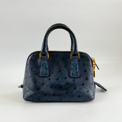 Prada navy blue ostrich leather micro top handle bag